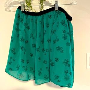 Green skirt with flowers
